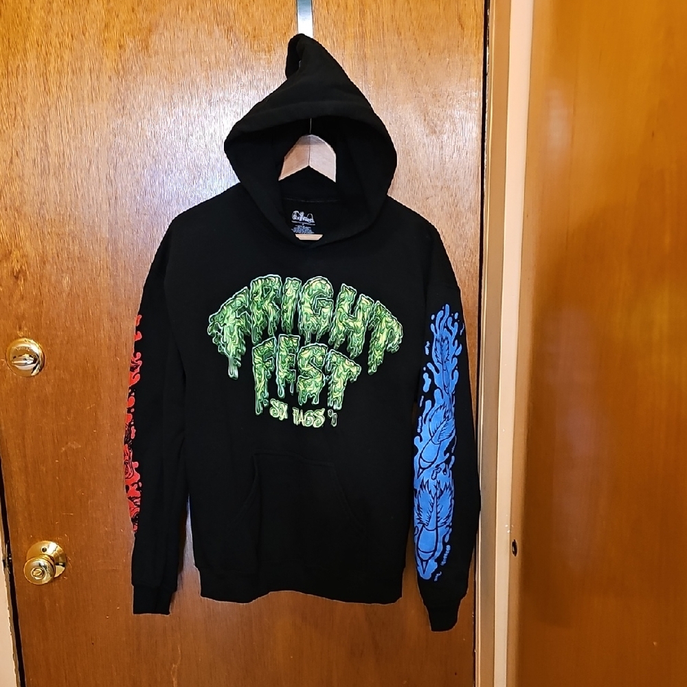 Black Graphic Hoodie with Green Drip Logo and Multi-Color Sleeve Art